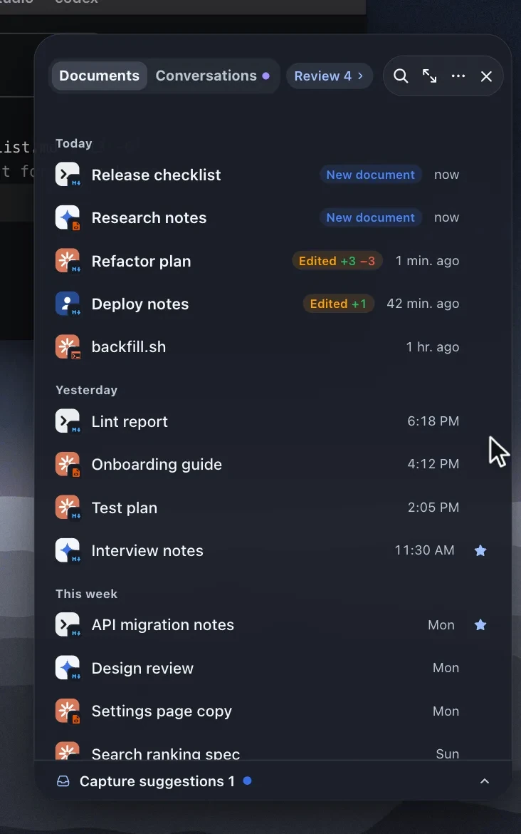The shelf open at the right edge with three new documents